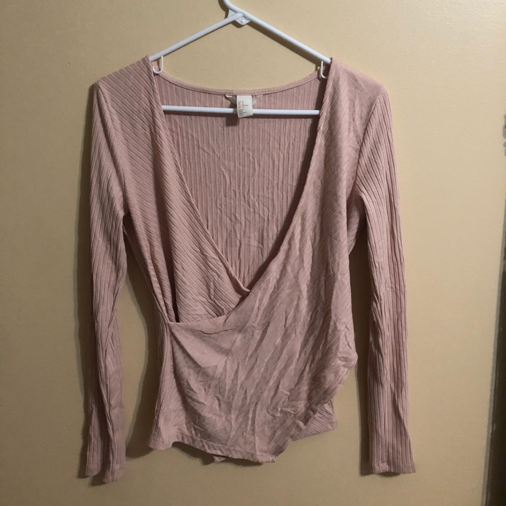 A pink nude V neck crossover top
